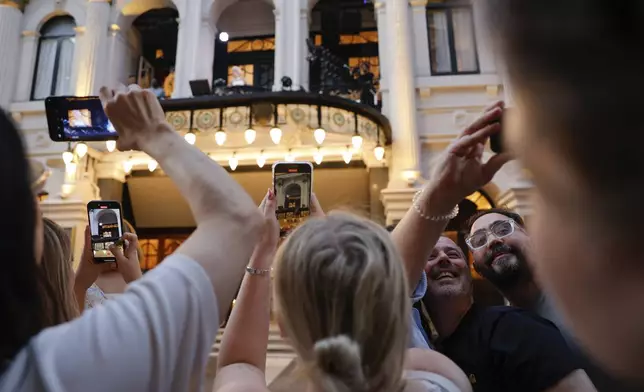 Rachel Zegler performs the song 'Don't Cry For Me Argentina' from The London Palladium Theatre balcony during a performance of Evita on Wednesday, June 18, 2025, in London. (Photo by Millie Turner/Invision/AP)