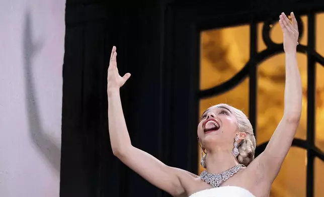 Rachel Zegler performs the song 'Don't Cry For Me Argentina' from The London Palladium Theatre balcony during a performance of Evita on Wednesday, June 18, 2025, in London. (Photo by Scott A Garfitt/Invision/AP)