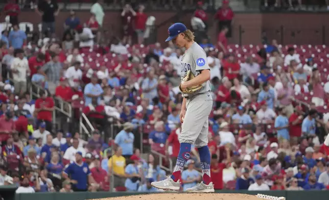 Chicago Cubs starting pitcher Ben Brown pauses on the mound after giving up a two-run home run to St. Louis Cardinals' Nolan Gorman during the sixth inning of a baseball game Monday, June 23, 2025, in St. Louis. (AP Photo/Jeff Roberson)