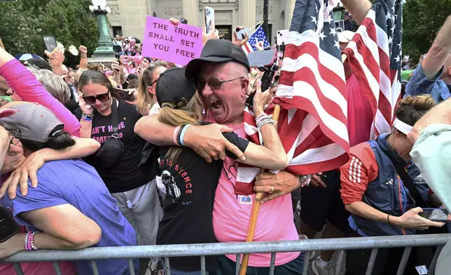 Supporters of Karen Read react after she was found not guilty of second-degree murder on Wednesday, June 18, 2025, in Dedham, Mass. (AP Photo/Josh Reynolds)