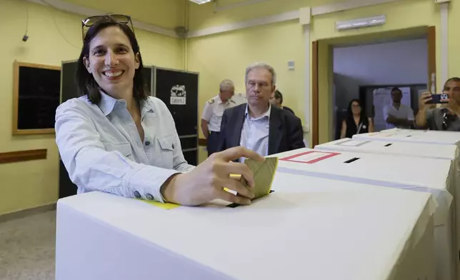 Leader of Italy’s center-left Democratic Party, Elly Schlein, casts her ballots in referendums on citizenship and job protections, at a polling station in Rome, Italy, Sunday, June 8, 2025. (Cecilia Fabiano/LaPresse via AP)