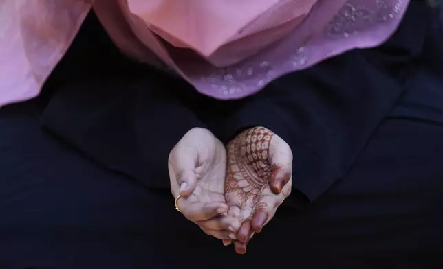A Muslim devotee offers Eid al-Adha prayers in Chennai, India, Saturday, June 7, 2025. (AP Photo/Mahesh Kumar A.)