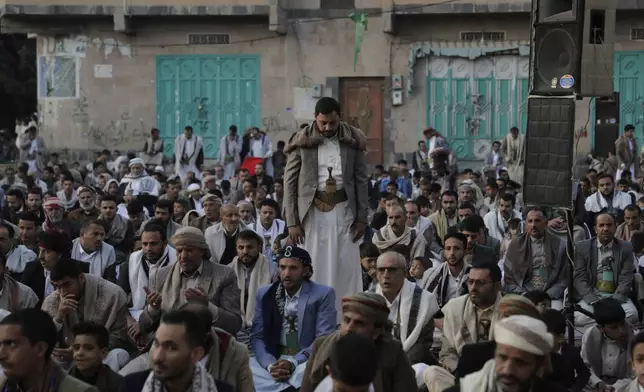 Muslims attend prayers on the first day of Eid al-Adha, outside a mosque in Sanaa, Yemen, Friday, June 6, 2025.(AP Photo/Osamah Abdulrahman)