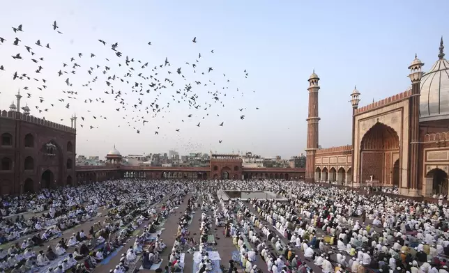 Devotees pray at Jama Masjid on the morning of the Muslim festival of Eid al-Adha in New Delhi, India, Saturday, June 7, 2025. (AP Photo/Karma Bhutia)
