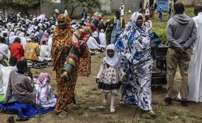 Muslims gather for Eid al-Adha prayers in Nairobi, Kenya Friday, June 6, 2025. (AP Photo/Samson Otieno)