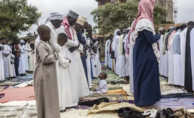 Muslims gather for Eid al-Adha prayers in Nairobi, Kenya Friday, June 6, 2025. (AP Photo/Samson Otieno)