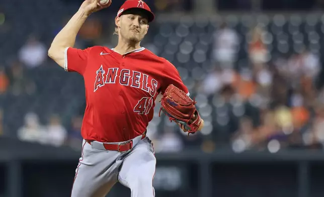 Los Angeles Angels starting pitcher Jack Kochanowicz throws in the first inning of a baseball game against the Baltimore Orioles, Friday, June 13, 2025, in Baltimore. (AP Photo/Alyssa Howell)