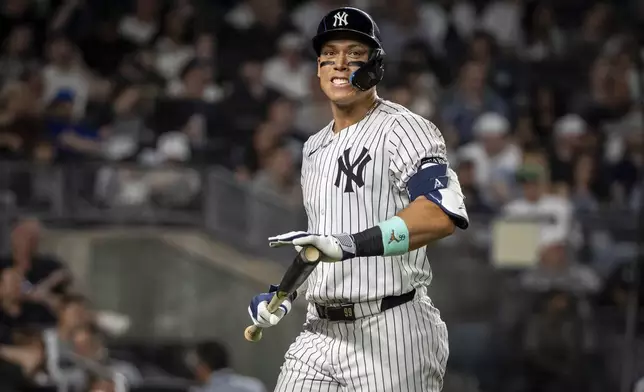 New York Yankees' Aaron Judge (99) reacts as he strikes out swinging during the sixth inning of a baseball game against the Los Angeles Angels, Wednesday, June 18, 2025, in New York. (AP Photo/Angelina Katsanis)