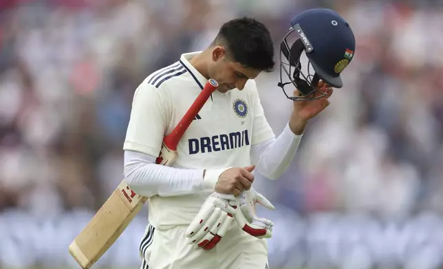 India's captain Shubman Gill reacts as he walks off the field after losing his wicket on day two of the first cricket test match between England and India at Headingley in Leeds, England, Saturday, June 21, 2025, (AP Photo/Scott Heppell)