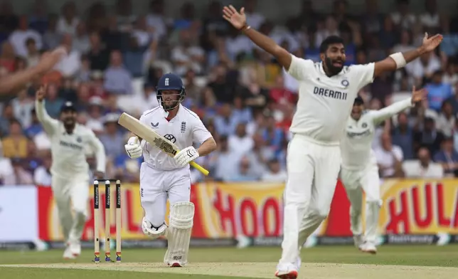 India's Jasprit Bumrah, right, appeals unsuccessfully for the wicket of England's Ben Duckett, center, on day two of the first cricket test match between England and India at Headingley in Leeds, England, Saturday, June 21, 2025, (AP Photo/Scott Heppell)