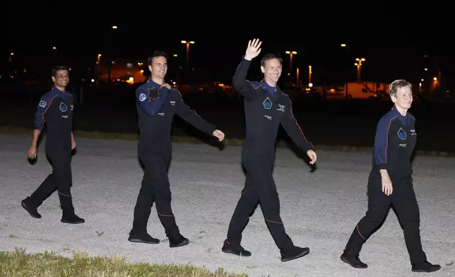 SpaceX Falcon 9 crew, left to right, Shubhanshu Shukla of the Indian Space Research Organization, Tibor Kapu of Hungary, Slawosz Uznanski-Wisniewski of Poland, and commander Peggy Whitson before departing for pad 39A for a mission to the International Space Station at the Kennedy Space Center in Cape Canaveral, Fla., Tuesday, June 24, 2025. (AP Photo/Terry Renna)
