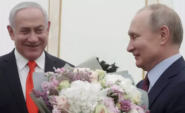 FILE - Israeli Prime Minister Benjamin Netanyahu and Russian President Vladimir Putin meet at the Kremlin in Moscow, Russia, on Jan. 30, 2020. (Maxim Shemetov/Pool Photo via AP, File)
