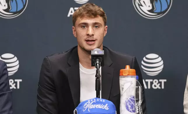 Dallas Mavericks' Cooper Flagg, the No. 1 overall pick in the NBA draft, speaks during an NBA basketball press conference at the team's practice facility, Friday, June 27, 2025, in Dallas. (AP Photo/Tony Gutierrez)