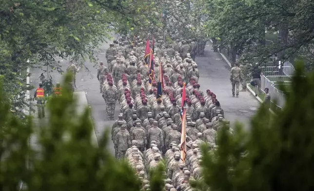 A military parade commemorating the Army's 250th anniversary, coinciding with President Donald Trump's 79th birthday, Saturday, June 14, 2025, in Washington. (AP Photo/Stephanie Scarbrough)