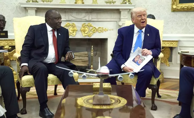 FILE - President Donald Trump meets with South Africa's President Cyril Ramaphosa in the Oval Office of the White House, in Washington, May 21, 2025. (AP Photo/Evan Vucci, File)