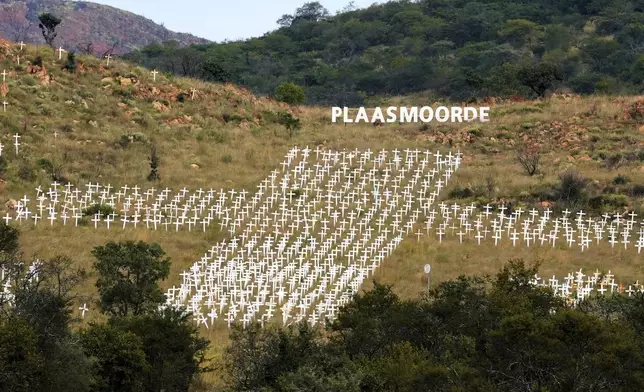 FILE - Crosses, memorializing white farmers who were killed, are seen at Witkruis Monument near Polokwane, South Africa, May 15, 2025. (AP Photo/Themba Hadebe, File)