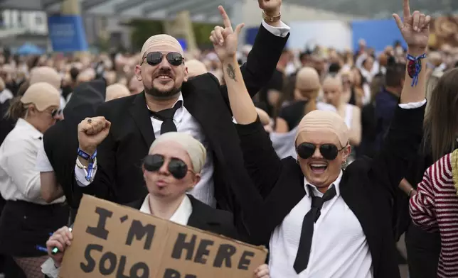 Fans gather in front of the O2 Arena prior to a performance by Pitbull on Monday, June 9, 2025, in London. (Photo by Scott A Garfitt/Invision/AP)