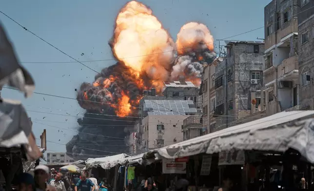 Thick smoke and flames erupt from an Israeli airstrike in Gaza City, Sunday, June 1, 2025. (AP Photo/Jehad Alshrafi)