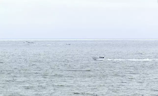 This image taken from video provided by KGTV shows where a twin-engine Cessna 414 crashed on Sunday, June 8, 2025, leaving a debris field about 3 miles west of Point Loma, a San Diego neighborhood that juts into the Pacific. (KGTV via AP)