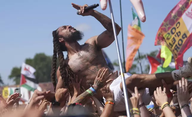 Bob Vylan performs on the West Holts Stage, during the Glastonbury Festival at Worthy Farm in Somerset. England, Saturday, June 28, 2025. (Yui Mok/PA via AP)