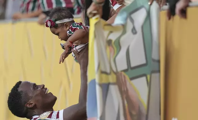 Fluminense's Jhon Arias greets supporters after beating Ulsan HD in a Club World Cup group F soccer match, Saturday, June 21, 2025, in East Rutherford, N.J. (AP Photo/Seth Wenig)