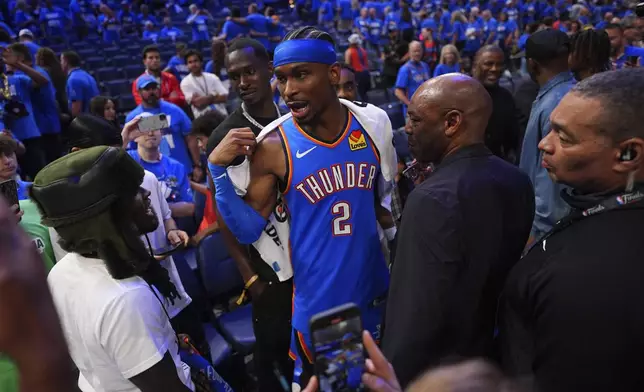 Oklahoma City Thunder guard Shai Gilgeous-Alexander (2) reacts after winning Game 2 of the NBA Finals basketball series against the Indiana Pacers Sunday, June 8, 2025, in Oklahoma City. (AP Photo/Julio Cortez)