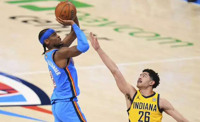 Oklahoma City Thunder guard Shai Gilgeous-Alexander (2) shoots against Indiana Pacers guard Ben Sheppard (26) during the second half of Game 2 of the NBA Finals basketball series Sunday, June 8, 2025, in Oklahoma City. (AP Photo/Kyle Phillips)