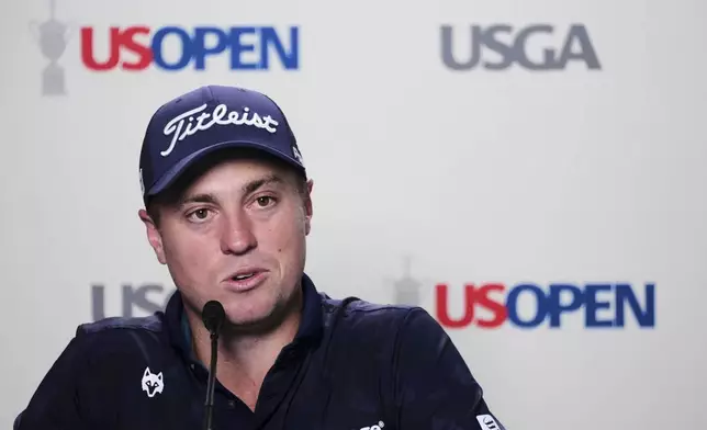Justin Thomas talks with reporters following his practice round for the 2025 US Open golf championship at Oakmont Country Club in Oakmont, Pa., Monday, June 9, 2025. (AP Photo/Gene J. Puskar)