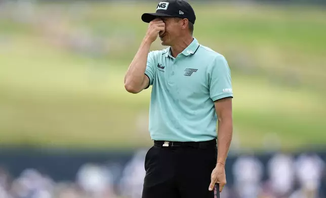 Carlos Ortiz, of Mexico, reacts after missing a putt on the fourth hole during the final round of the U.S. Open golf tournament at Oakmont Country Club Sunday, June 15, 2025, in Oakmont, Pa. (AP Photo/Charlie Riedel)