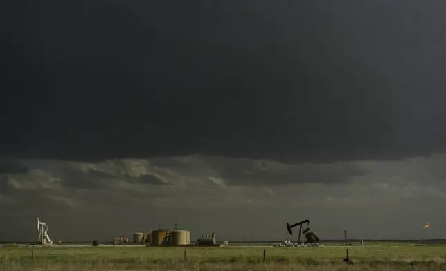 Pumpjacks operate during a Project ICECHIP operation Friday, June 6, 2025, near Levelland, Texas. (AP Photo/Carolyn Kaster)