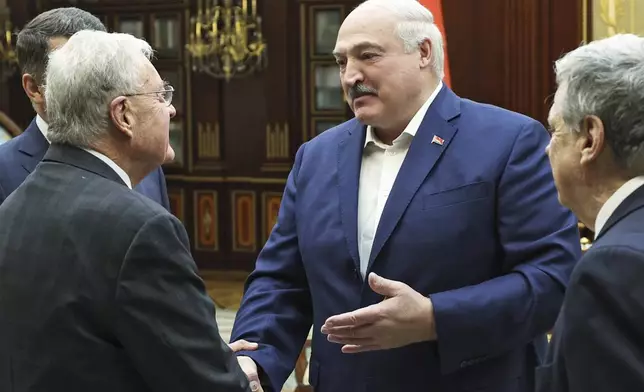 In this photo released by the Belarusian Presidential Press Service, Belarusian President Alexander Lukashenko, second right, greets Keith Kellogg, the U.S. Special Envoy for Ukraine and Russia, left, during their meeting in Minsk, Belarus, Saturday, June 21, 2025. (Belarusian Presidential Press Service via AP)