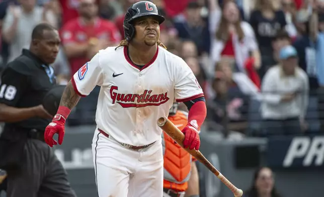 Cleveland Guardians' Jose Ramirez watches his two-run home run off Houston Astros relief pitcher Shawn Dubin during the sixth inning of a baseball game, Saturday June 7, 2025, in Cleveland. (AP Photo/Phil Long)