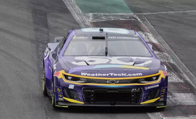 Shane Van Gisbergen drives during a qualifying session for the NASCAR Cup Series auto race at Hermanos Rodriguez race track in Mexico City, Saturday, June 14, 2025. (AP Photo/Fernando Llano)