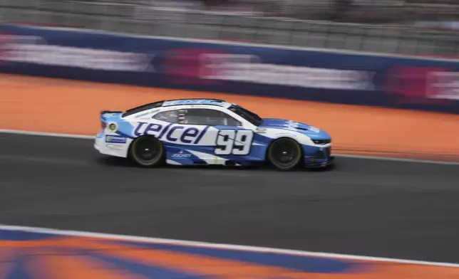 Daniel Suarez drives during a qualifying session for the NASCAR Cup Series auto race at Hermanos Rodriguez race track in Mexico City, Saturday, June 14, 2025. (AP Photo/Fernando Llano)