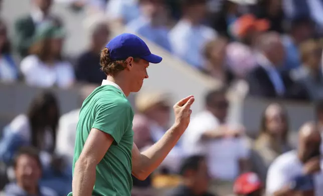 Italy's Jannik Sinner gestures as he plays against Spain's Carlos Alcaraz during their final match of the French Tennis Open at the Roland-Garros stadium in Paris, Sunday, June 8, 2025. (AP Photo/Lindsey Wasson)