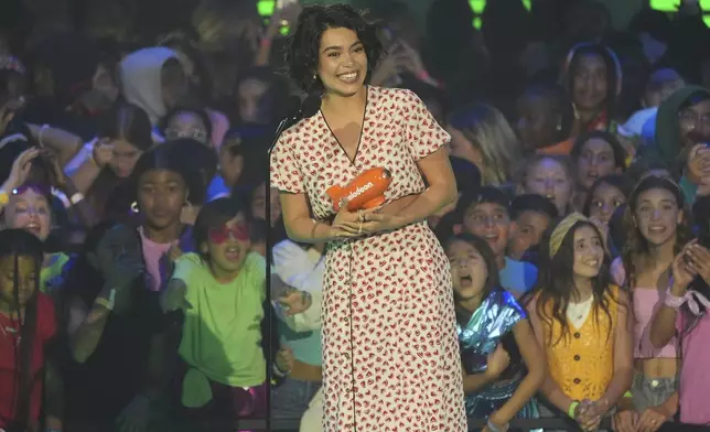 Auli'i Cravalho accepts the award for favorite female animated voice from a movie for "Moana 2" during the Nickelodeon Kids' Choice Awards on Saturday, June 21, 2025, at The Barker Hangar in Santa Monica, Calif. (AP Photo/Chris Pizzello)