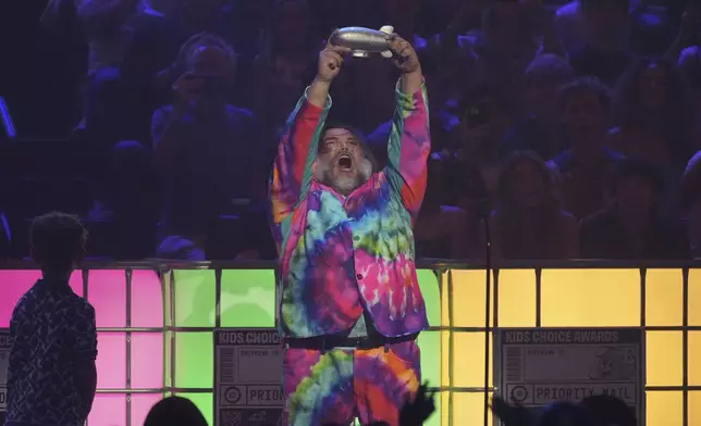 Jack Black accepts the award for king of comedy during the Nickelodeon Kids' Choice Awards on Saturday, June 21, 2025, at The Barker Hangar in Santa Monica, Calif. (AP Photo/Chris Pizzello)