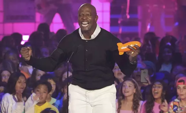 Terry Crews accepts the the award for favorite reality tv show for "America's Got Talent" during the Nickelodeon Kids' Choice Awards on Saturday, June 21, 2025, at The Barker Hangar in Santa Monica, Calif. (AP Photo/Chris Pizzello)