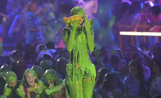 Host Tyla gets slimed during the Nickelodeon Kids' Choice Awards on Saturday, June 21, 2025, at The Barker Hangar in Santa Monica, Calif. (AP Photo/Chris Pizzello)
