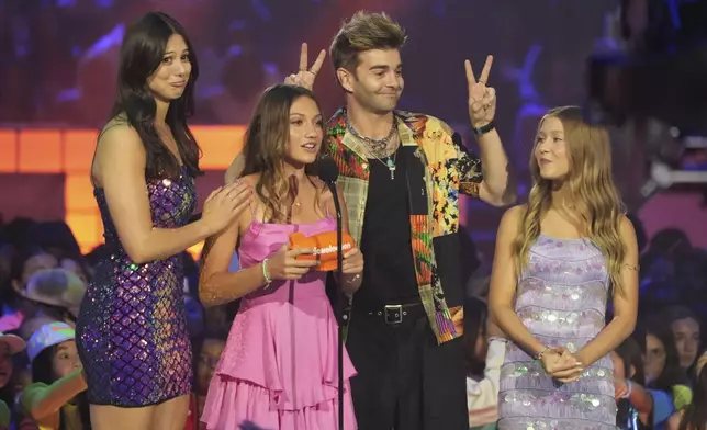 Kira Kosarian, from left, Maya Le, Jack Griffo, and Kinley Cunningham accept the the award for favorite kids tv show for "The Thundermans: Undercover" during the Nickelodeon Kids' Choice Awards on Saturday, June 21, 2025, at The Barker Hangar in Santa Monica, Calif. (AP Photo/Chris Pizzello)