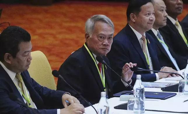 Thai Border Affairs Advisor to the Ministry of Foreign Affairs Prasas Prasasvinitchai, second from left, attends a meeting of the Cambodian-Thai joint commission on demarcation for land boundary in Phnom Penh, Cambodia, Saturday, June 14, 2025. (AP Photo/Heng Sinith)