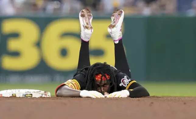 Pittsburgh Pirates' Oneil Cruz reacts after getting tagged out on a steal attempt during the eighth inning of a baseball game against the Houston Astros, Tuesday, June 3, 2025, in Pittsburgh. (AP Photo/Matt Freed)