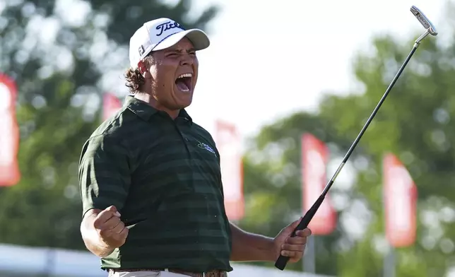 Aldrich Potgieter, of South Africa celebrates his winning putt in a playoff during the final round of the Rocket Classic golf tournament at the Detroit Golf Club, Sunday, June 29, 2025, in Detroit. (AP Photo/Paul Sancya)