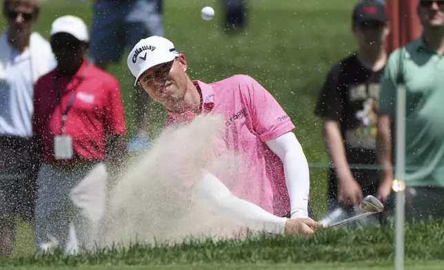 Max Greyserman hits from a bunker on the third hole during the final round of the Rocket Classic golf tournament at the Detroit Golf Club, Sunday, June 29, 2025, in Detroit. (AP Photo/Paul Sancya)