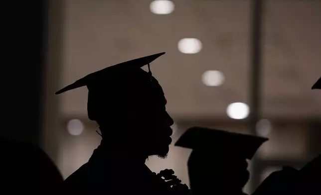FILE - A Morehouse College student lines up before the school commencement, May 19, 2024, in Atlanta. (AP Photo/Brynn Anderson, File)
