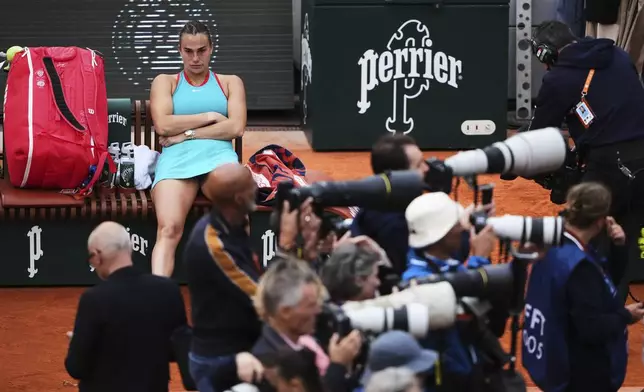 Aryna Sabalenka of Belarus sits on the bench while waiting for the trophy ceremony after losing the final match of the French Tennis Open to Coco Gauff of the U.S. at the Roland-Garros stadium in Paris, Saturday, June 7, 2025. (AP Photo/Lindsey Wasson)