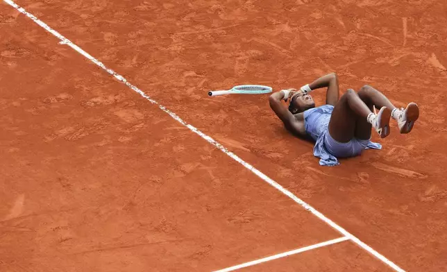 Coco Gauff of the U.S. reacts after winning the final match of the French Tennis Open against Aryna Sabalenka of Belarus at the Roland-Garros stadium in Paris, Saturday, June 7, 2025. (AP Photo/Lindsey Wasson)