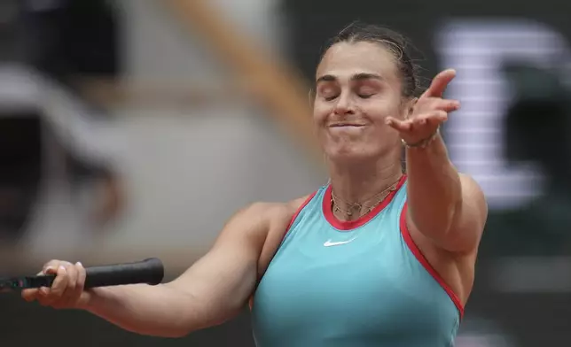 Aryna Sabalenka of Belarus reacts as she plays against Coco Gauff of the U.S. during their final match of the French Tennis Open at the Roland-Garros stadium in Paris, Saturday, June 7, 2025. (AP Photo/Christophe Ena)