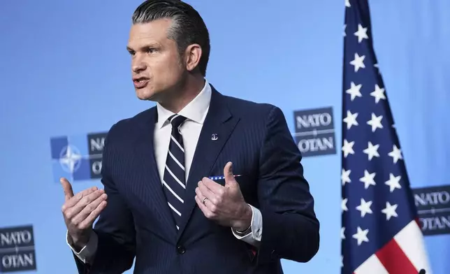 FILE - Defense Secretary Pete Hegseth delivers a statement ahead of a meeting of NATO defense ministers at NATO headquarters in Brussels, June 5, 2025. (AP Photo/Virginia Mayo, File)