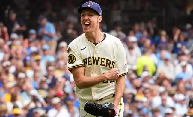 Milwaukee Brewers pitcher Jacob Misiorowski (32) reacts to striking out Pittsburgh Pirates' Oneil Cruz for the third out in the fourth inning of a baseball game, Wednesday, June 25, 2025, in Milwaukee. (AP Photo/Kayla Wolf)